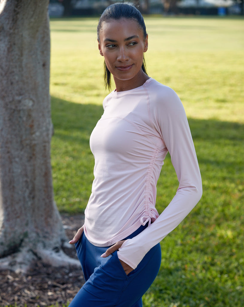Women at the park  wearing tickle me pink long sleeve crew with navy jogger. (Style 2006) - BloqUV