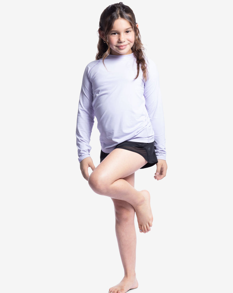 Girl wearing lavender color top with exercise shorts.  (Style 1005K) - BloqUV