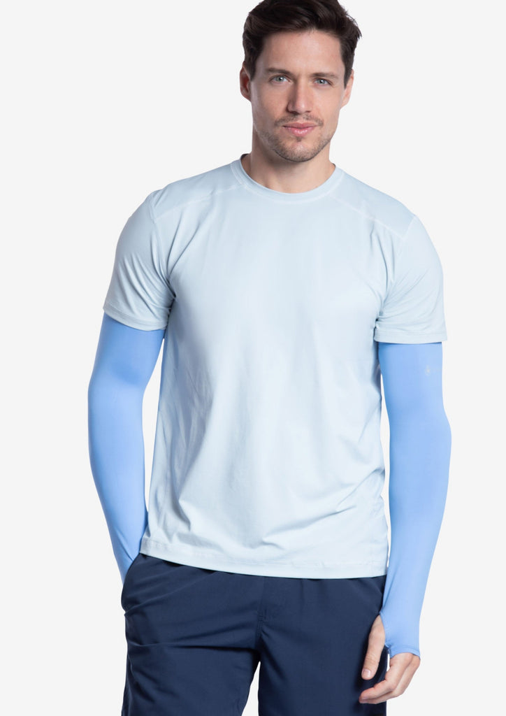 Man wearing indigo color unisex sleeves with short sleeve soft grey crew shirt. (Style 5005) - BloqUV SUN SLEEVES (5005) - BloqUV