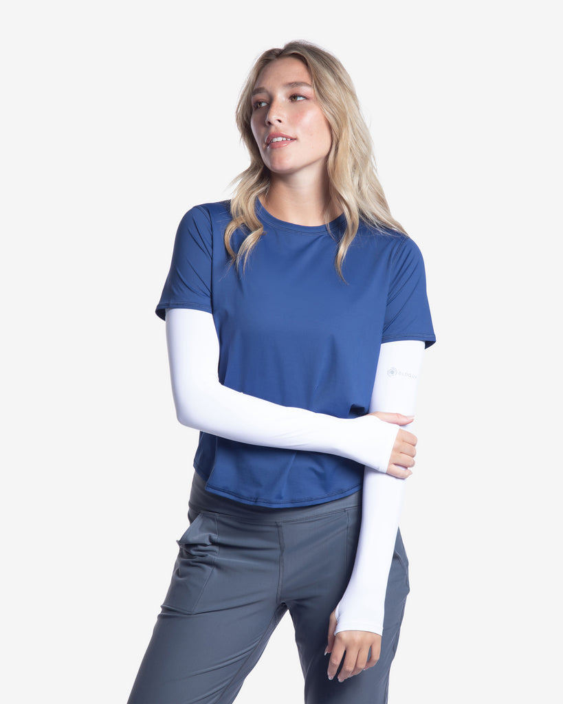 Women wearing navy short sleeve crew top with white sun sleeves and smoke joggers tights.  (Style 1101) - BloqUV