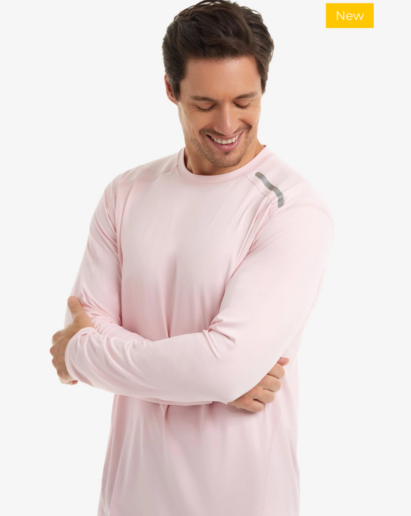 Man wearing long sleeve jet tee shirt in tickle me pink. (Style 12002) - BloqUV