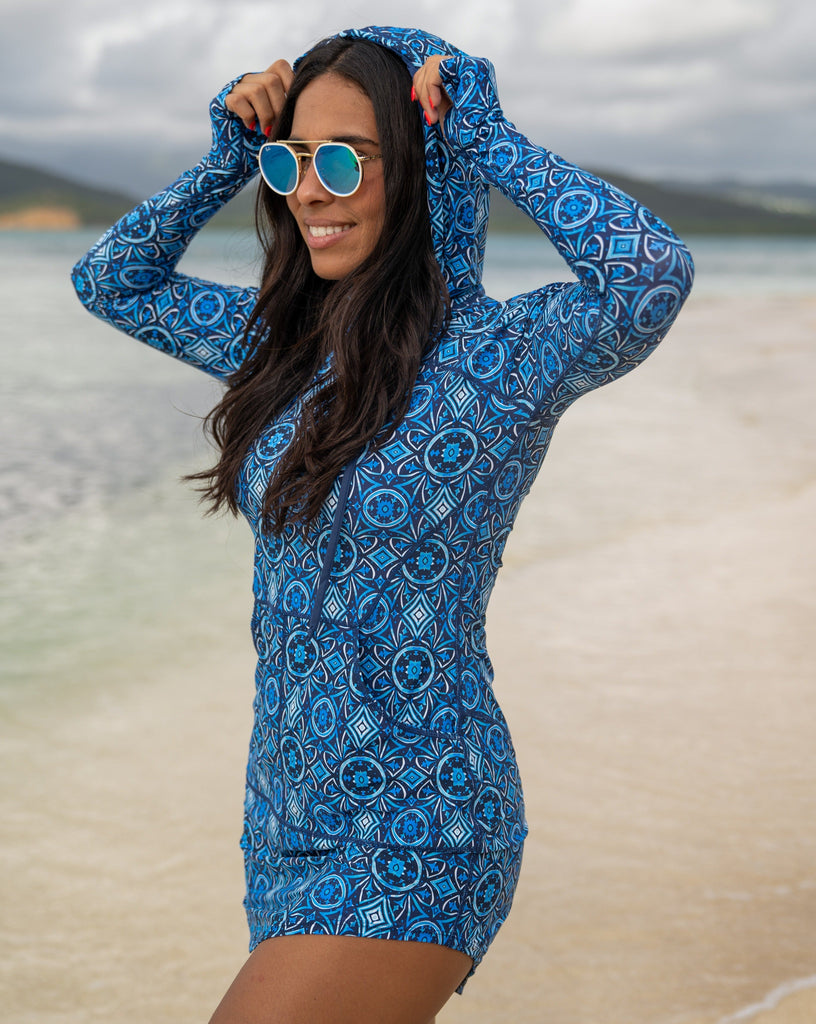 Women standing by the ocean outside wearing moroccan tile hoodie dress. (Style 2009J) - BloqUV