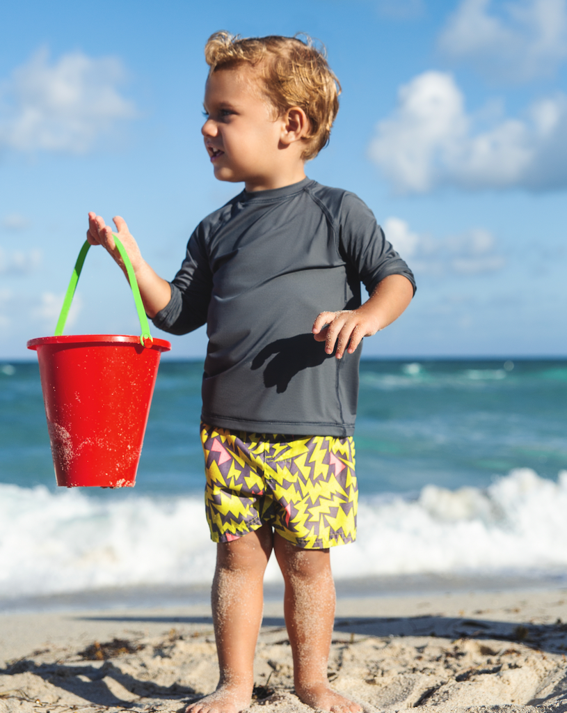 Toddler boy playing at the beach wearing smoke crew neck top. (Style 1005T) - BloqUV