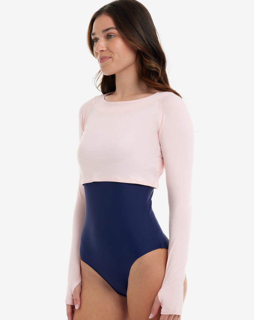 Women wearing tickle me pink crop top with navy swim suit. (Style 4001) - BloqUV