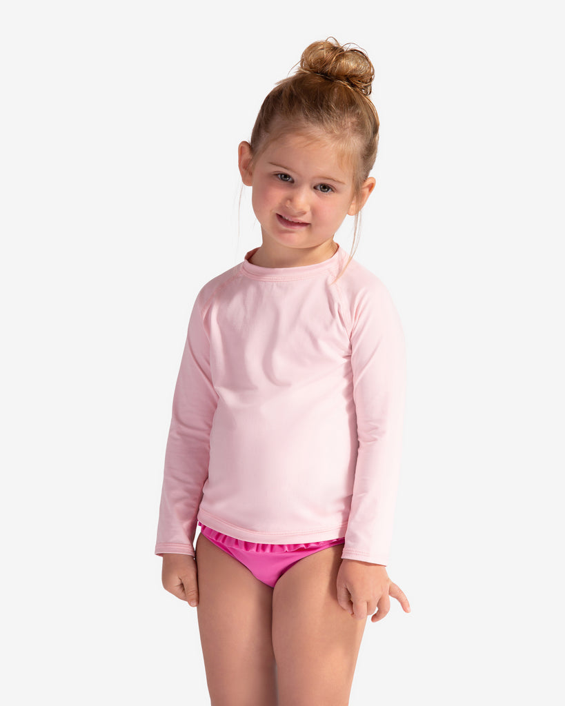 Toddler girl wearing tickle me pink crew neck top. (Style 1005T) - BloqUV