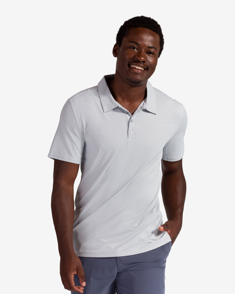 Man wearing short sleeve polo shirt in soft grey. (Style 11004) - BloqUV