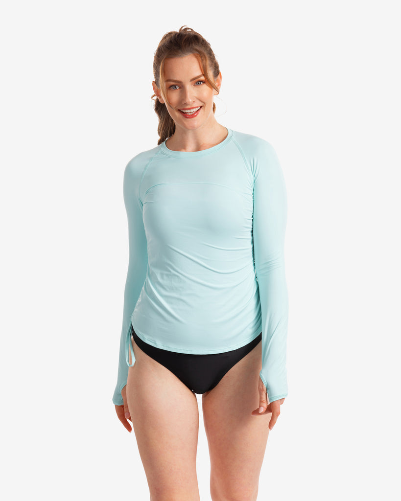 Women wearing mint long sleeve drawstring crew with swimsuit. (Style 2006) - BloqUV