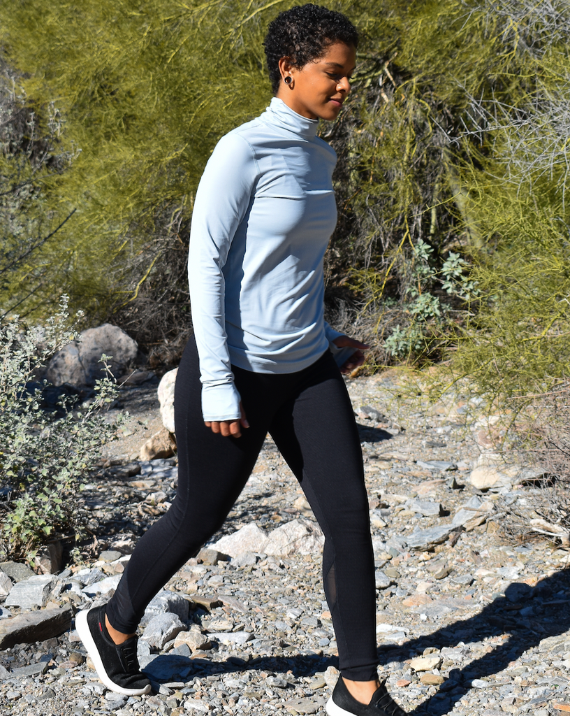 Women hiking wearing soft grey turtle neck top with black tights. (Style 2013) - BloqUV