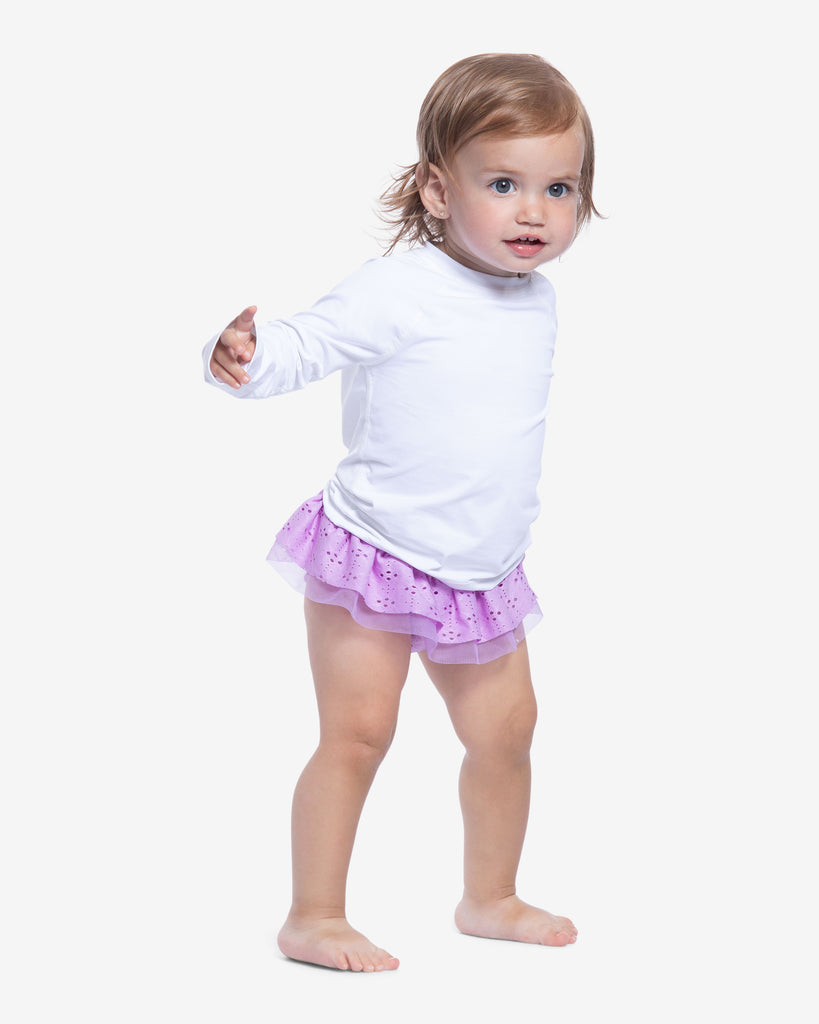 Toddler girl wearing white crew neck top. (Style 1005T) - BloqUV
