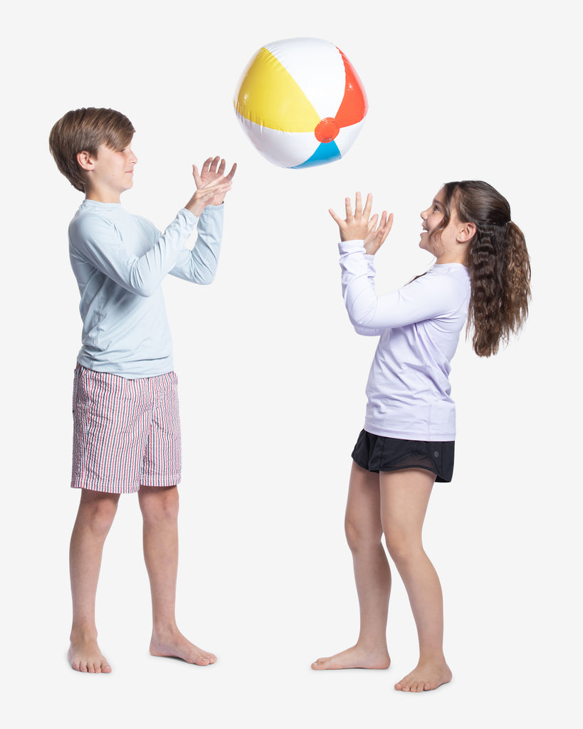 Boy wearing soft grey color top and girl wearing lavender color top while playing with beach ball. (Style 1005K) - BloqUV