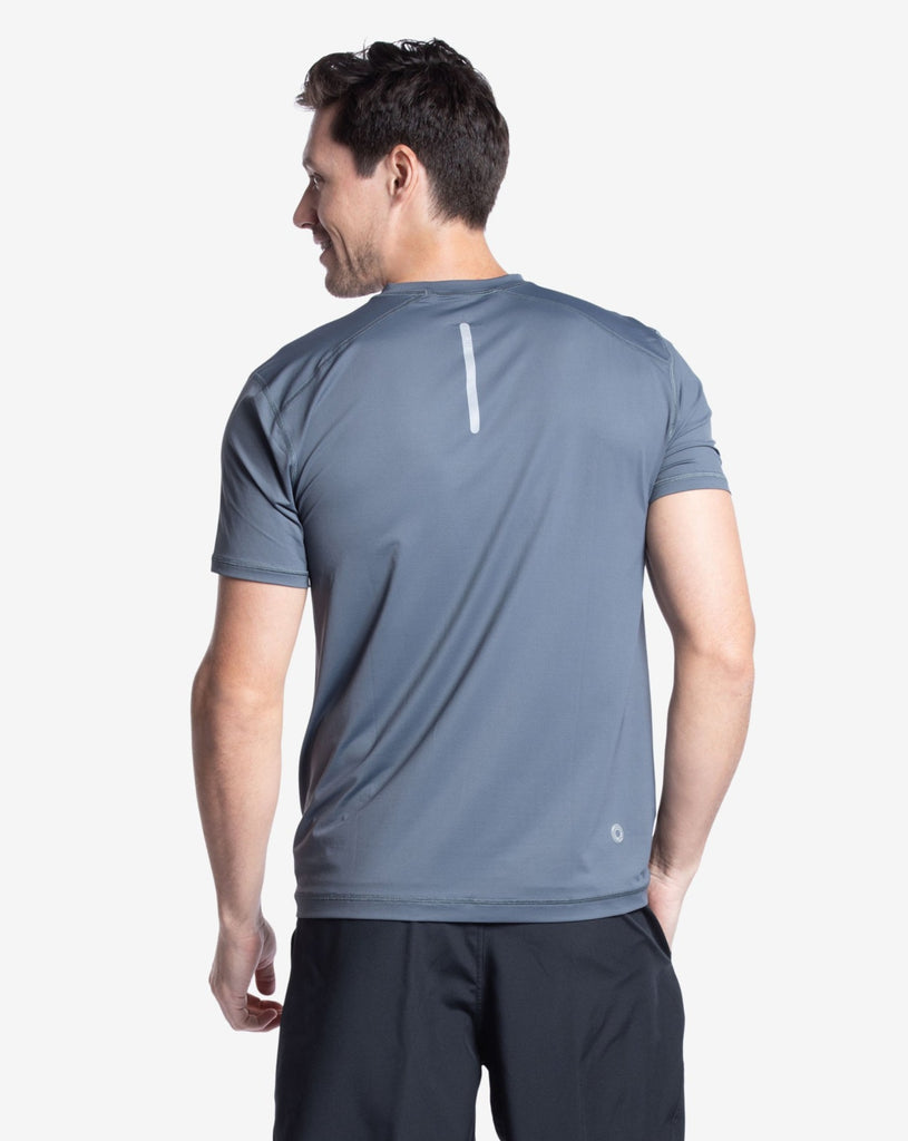 Man wearing short sleeve crew shirt in smoke blue. Picture shows back of shirt with reflective top. (Style 11002) - BloqUV