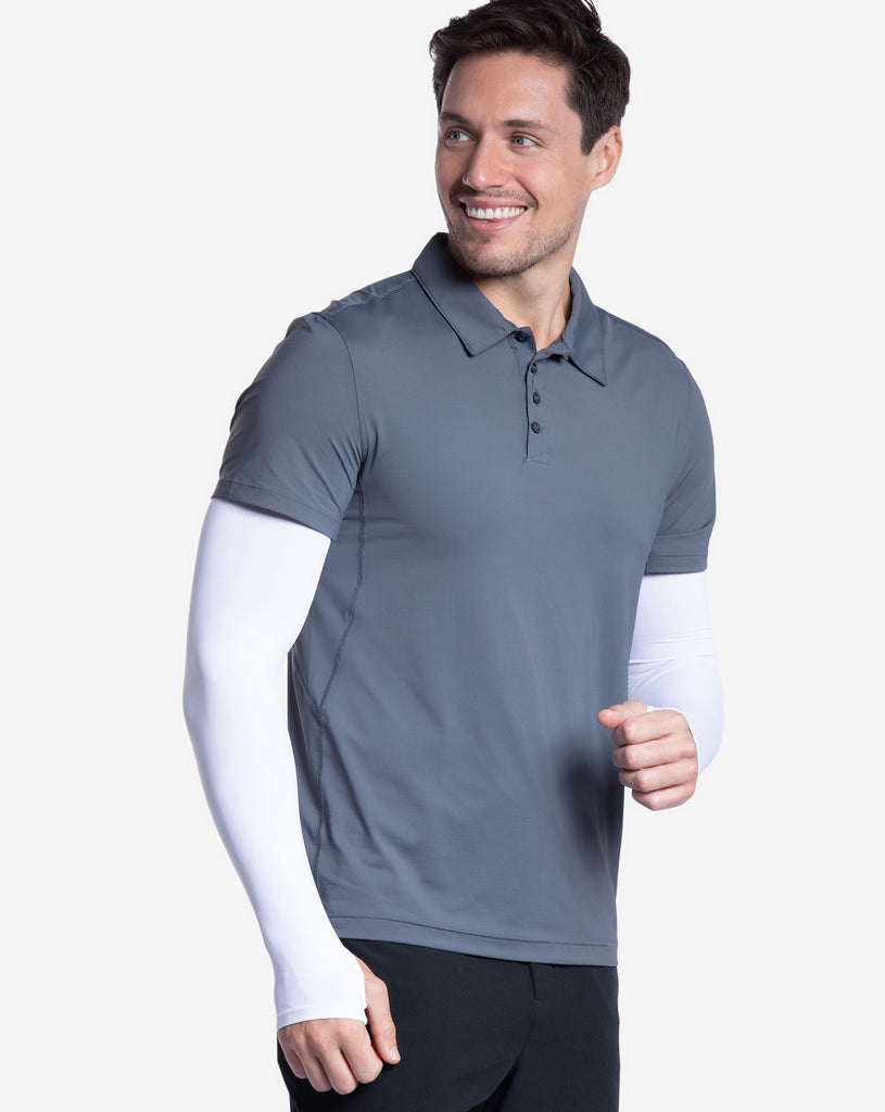 Man wearing short sleeve polo shirt in smoke with sun protective sleeves in white. (Style 11004) - BloqUV