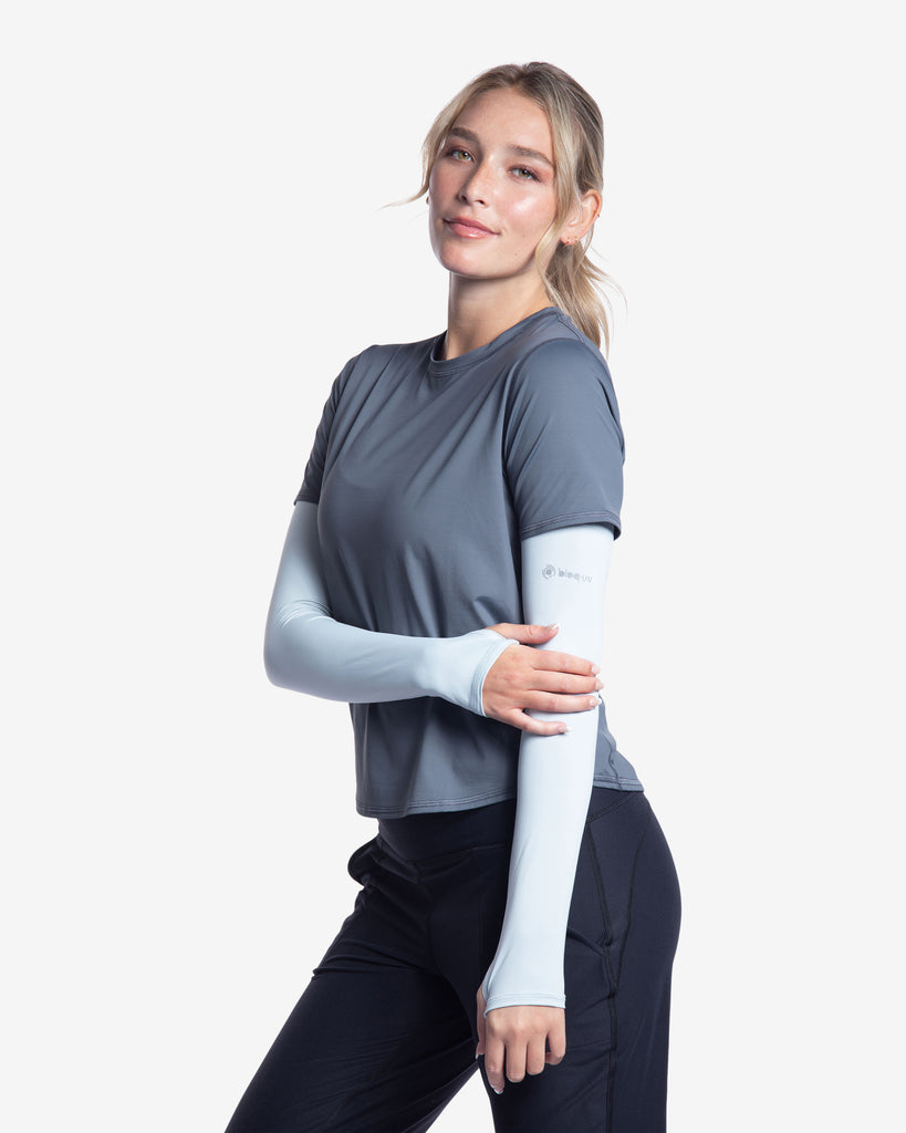 Women wearing soft grey color unisex sleeves with short sleeve smoke crew. (Style 5005) - BloqUV