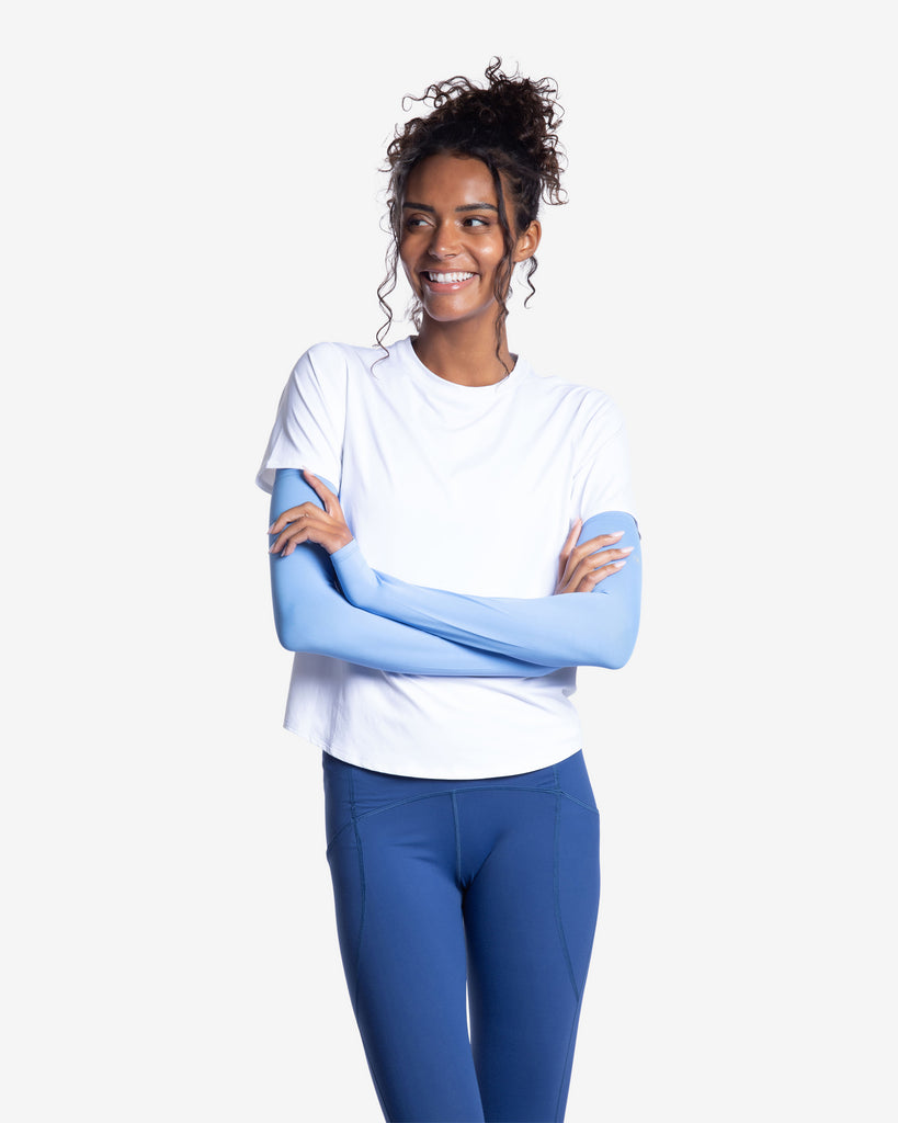 Women wearing indigo color unisex sleeves with short sleeve white crew. (Style 5005) - BloqUV