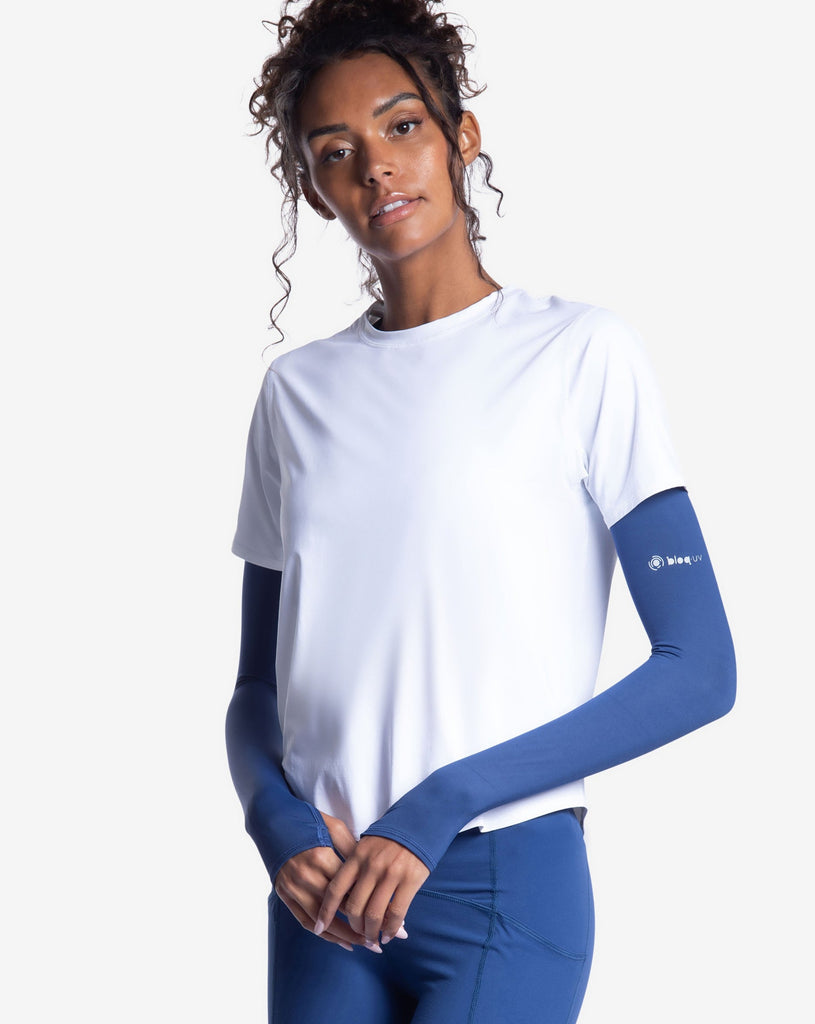 Women wearing navy color unisex sleeves with short sleeve white crew. (Style 5005) - BloqUV