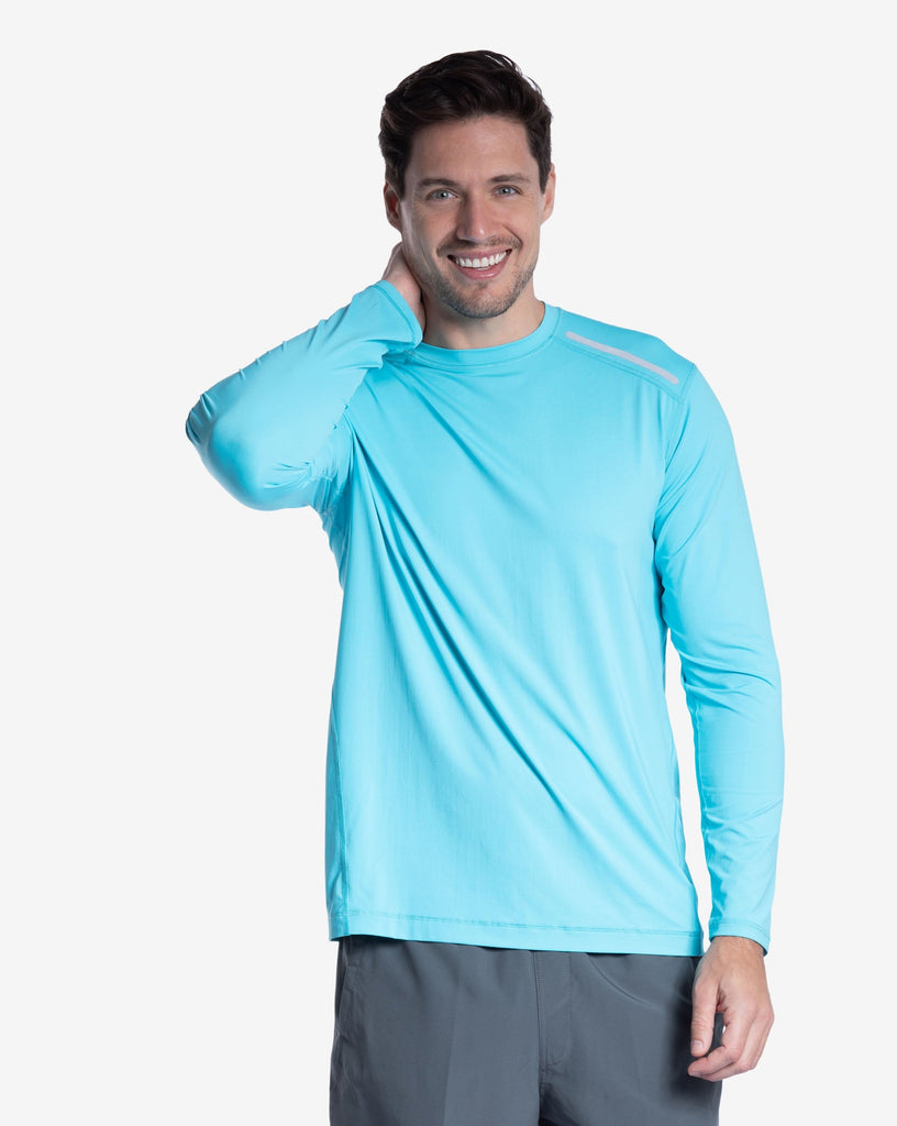 Man wearing long sleeve jet tee shirt in light turquoise. (Style 12002) - BloqUV