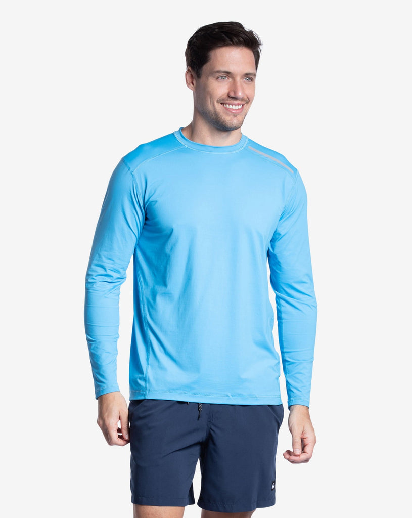 Man wearing long sleeve jet tee shirt in ocean blue. (Style 12002) - BloqUV