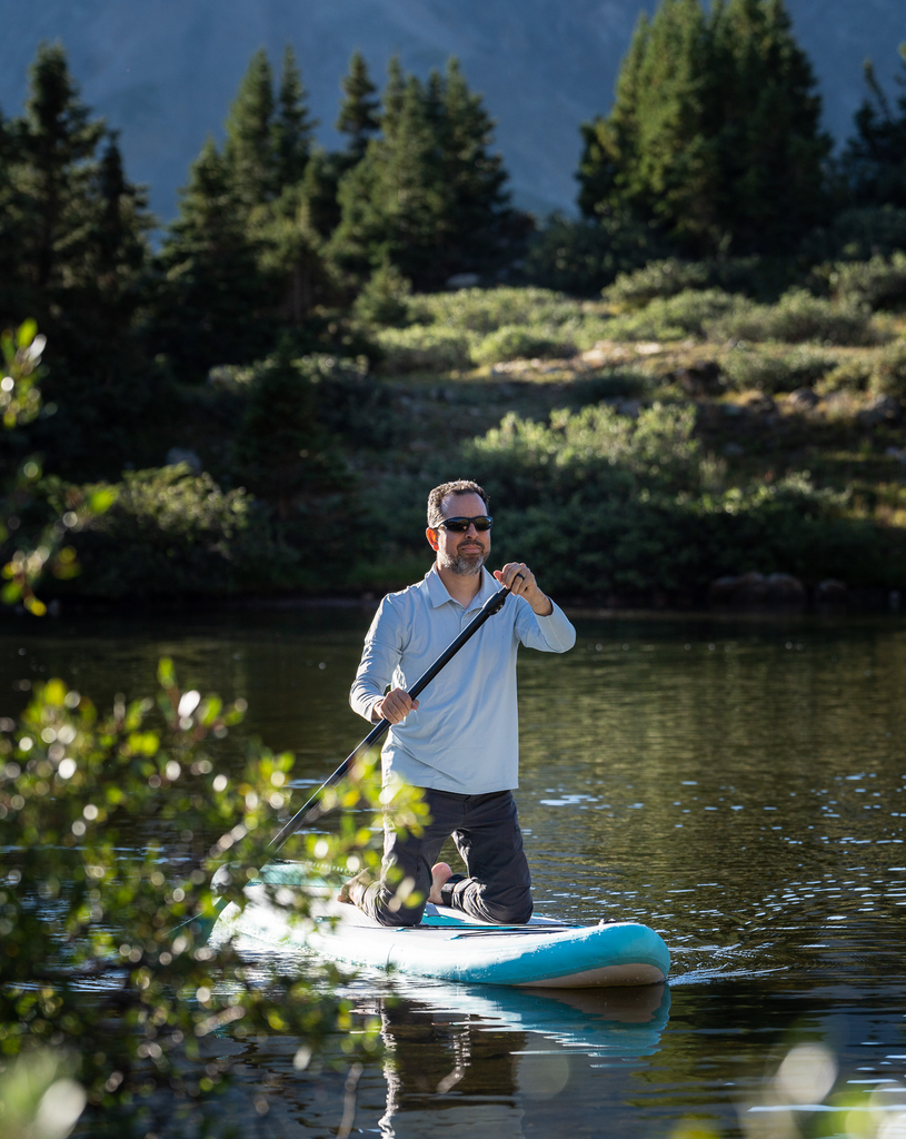 Man paddle boarding wearing long sleeve collared shirt in soft grey. (Style 12004) - BloqUV