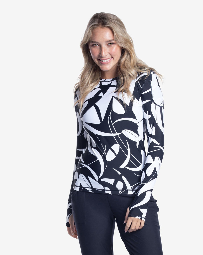 Women wearing printed black and white long sleeve 24/7 shirt with black joggers. (Style 2001J) - BloqUV