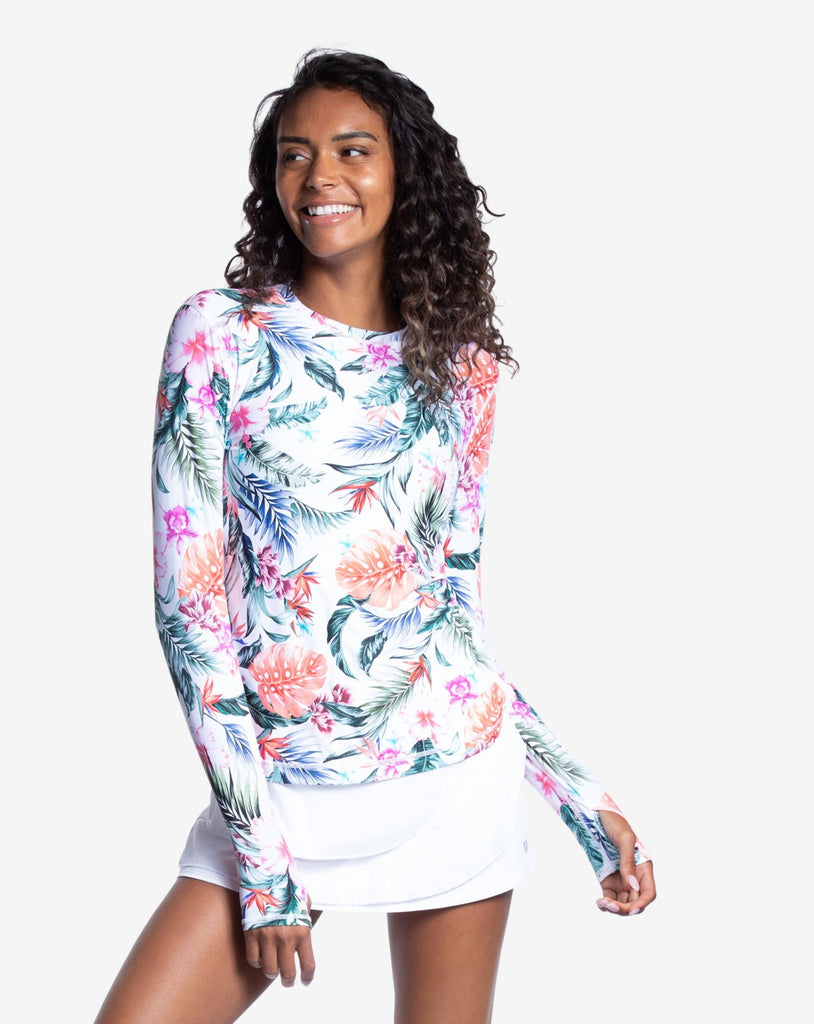Women wearing printed white top with Hawaiian print long sleeve 24/7 shirt with white skirt. (Style 2001J) - BloqUV
