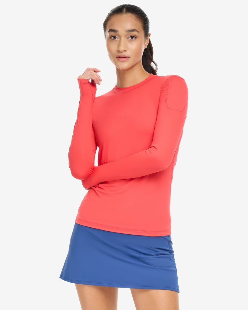 Women wearing 24/7 lave red top with navy skort. (Style 6100) - BloqUV