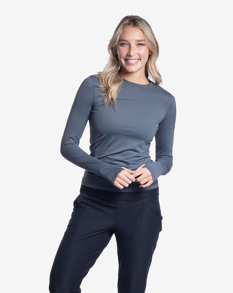 Women wearing smoke long sleeve 24/7 shirt with black tights. (Style 2001) - BloqUV