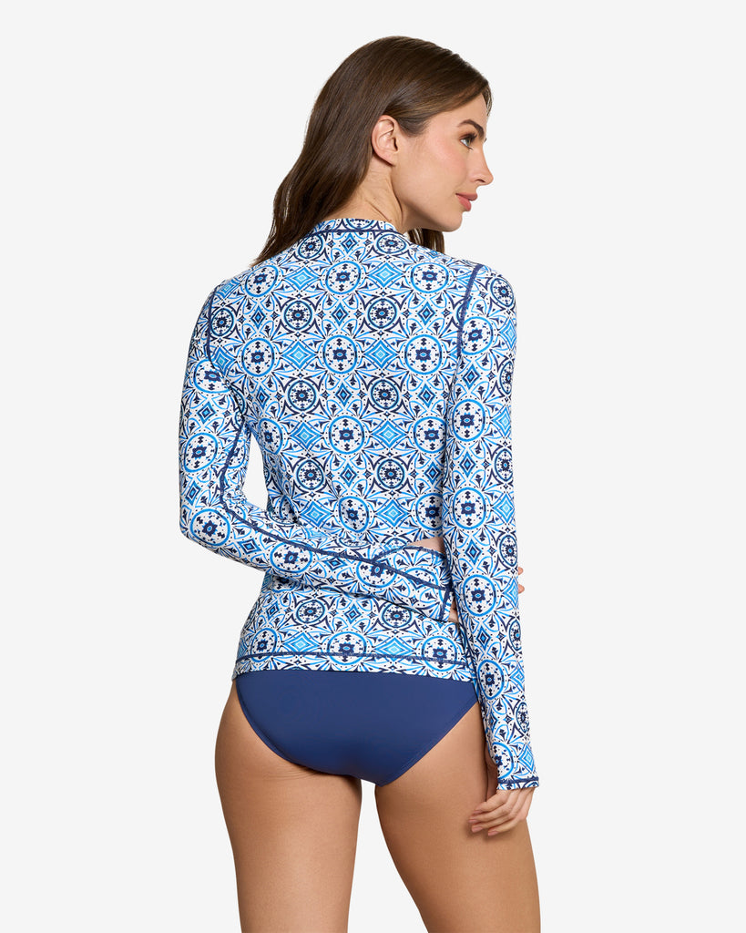 Women wearing printed top with Moroccan Tile navy print long sleeve 24/7 shirt with swimsuit. (Style 2001J) - BloqUV