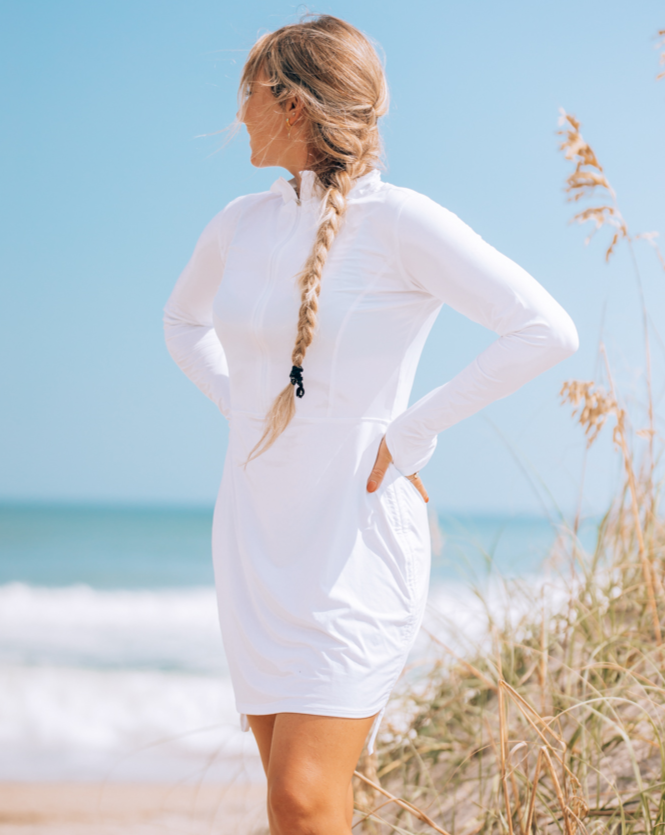 Women at the beach wearing white relaxed cover up dress. (Style 2011) - BloqUV