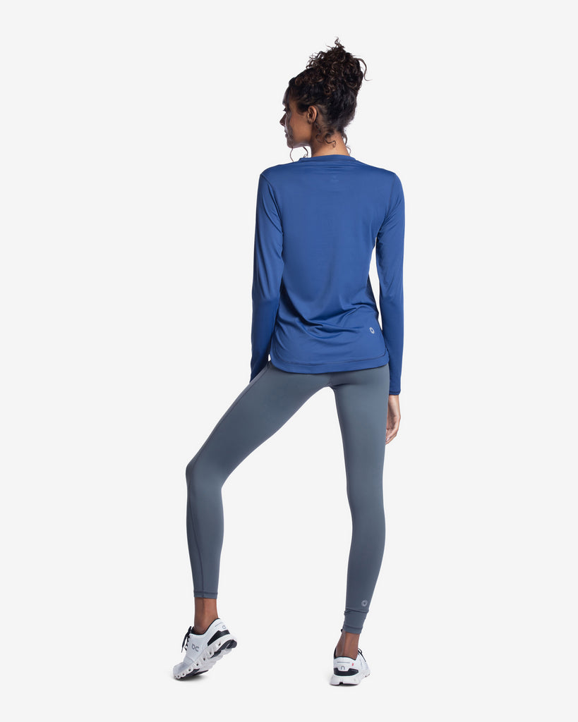 Women wearing navy relaxed scallop top with smoke tights. Picture shows back of shirt. (Style 2015) - BloqUV
