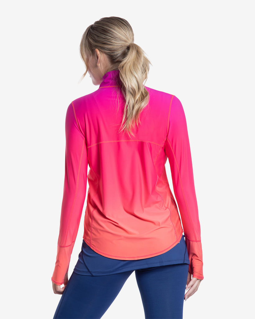 Women wearing ombre flowers of the sun long sleeve relaxed mock zip top with navy capri skort bottom. Back of shirts shown. (Style 3002J) - BloqUV