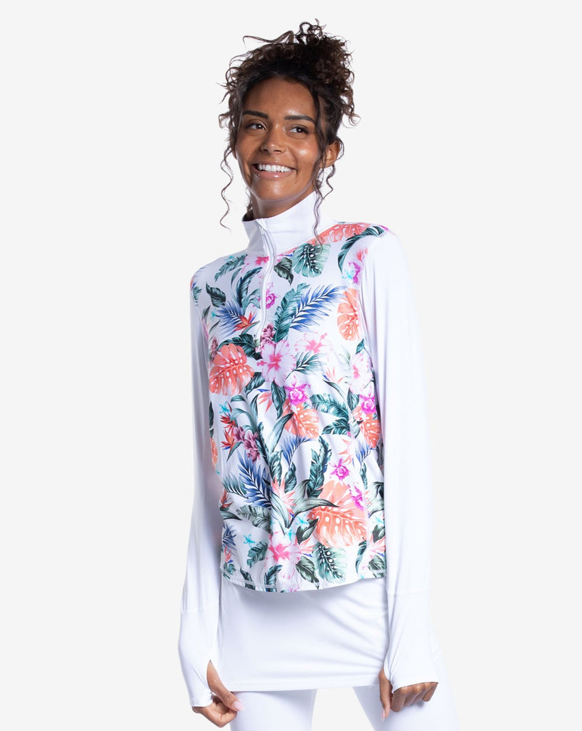 Women wearing printed white top with Hawaiian print long sleeve relaxed mock zip top with white capri skort bottom. (Style 3002J) - BloqUV