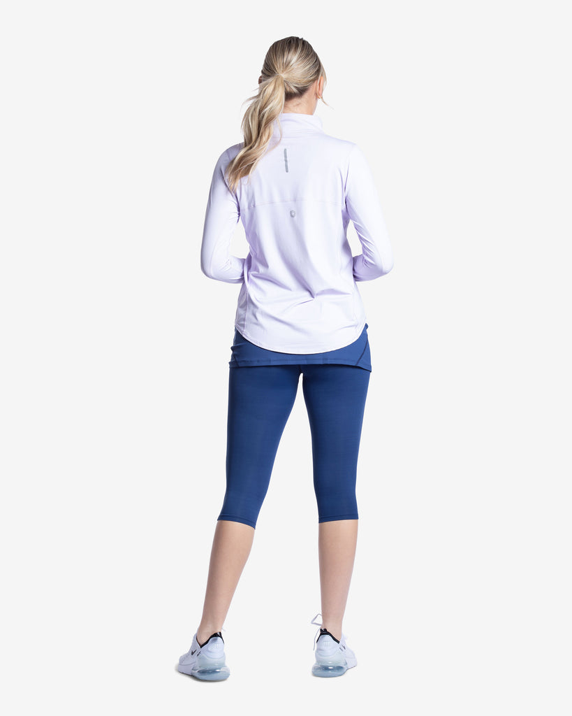 Women wearing lavender relaxed mock zip top. Picture shows back of the shirt with reflector. (Style 3002) - BloqUV