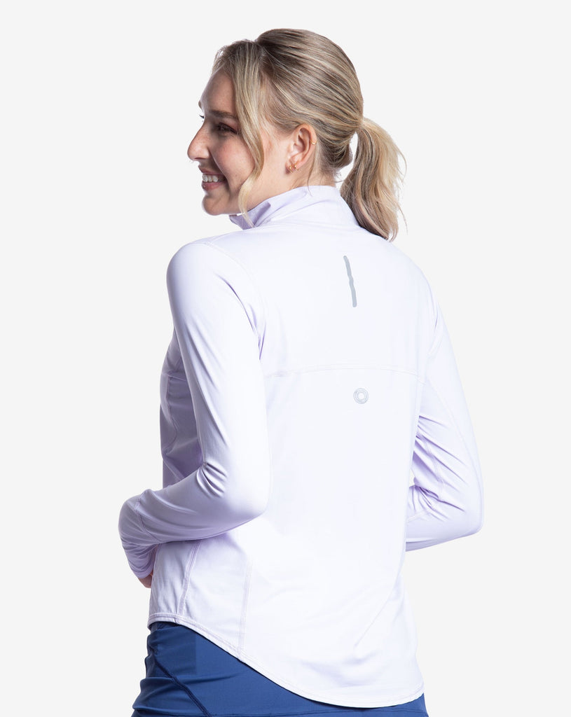 Women wearing lavender relaxed mock zip top. Picture shows back of the shirt with reflector. (Style 3002) - BloqUV