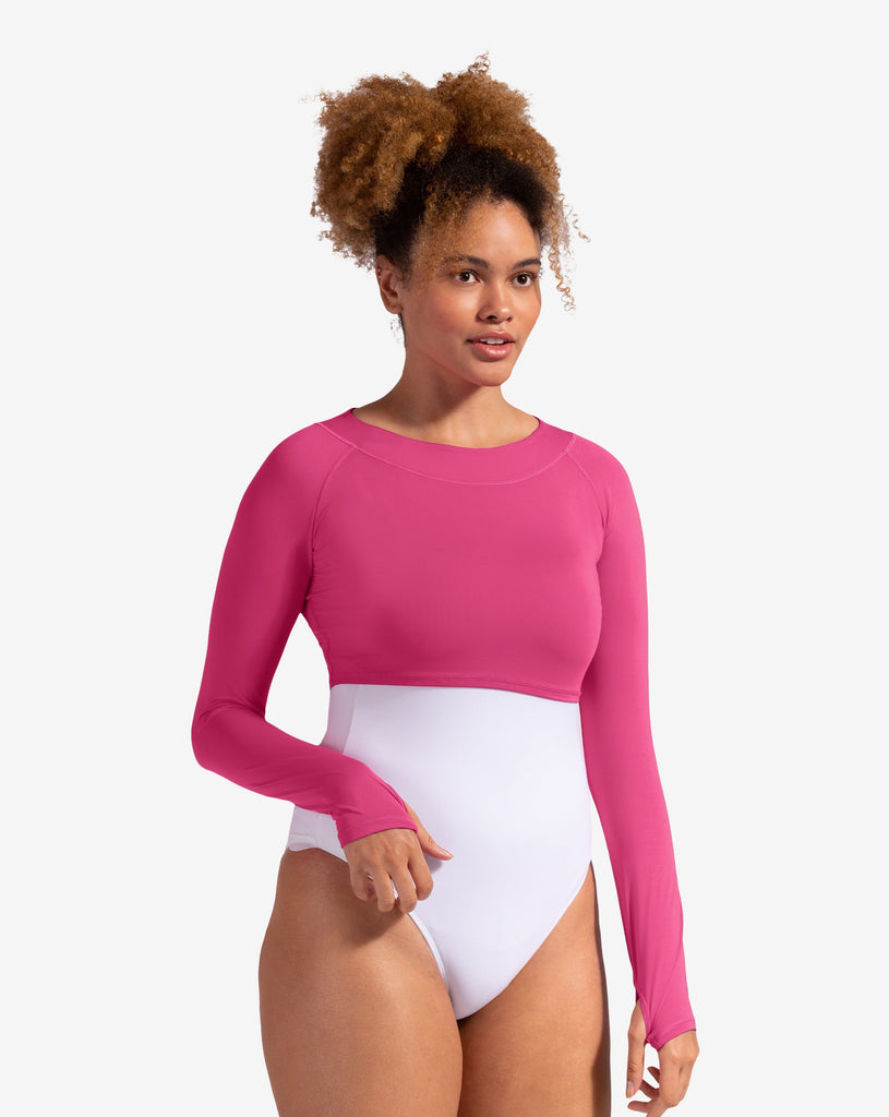 Women wearing passion pink crop top with white swimsuit. (Style 4001) - BloqUV