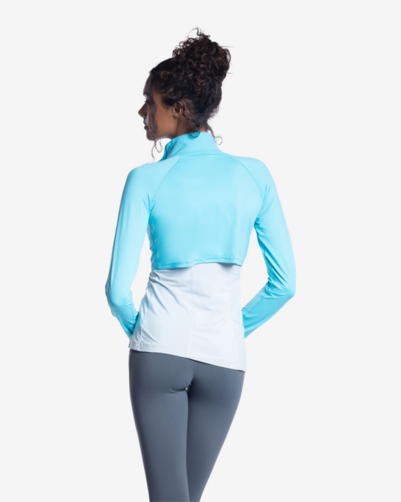 Women wearing light turquoise full zip crop top over tank top with smoke leggings. Picture shows back of shirt. (Style 4010) - BloqUV
