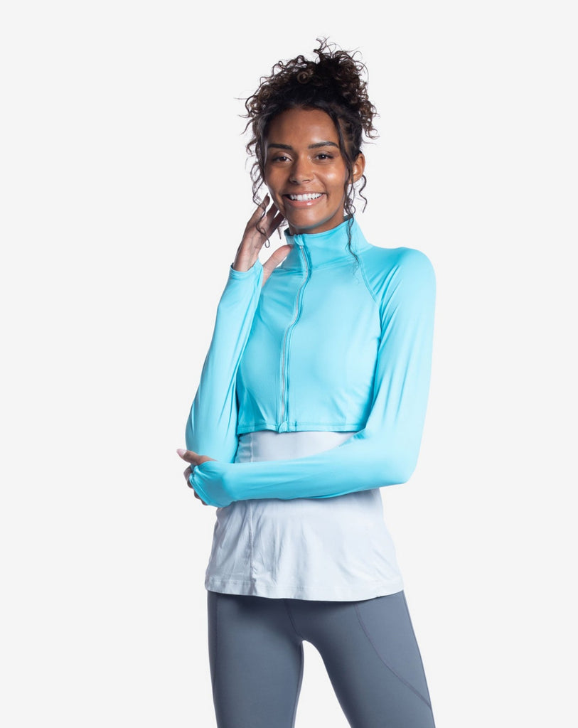 Women wearing light turquoise full zip crop top over tank top with smoke leggings. (Style 4010) - BloqUV