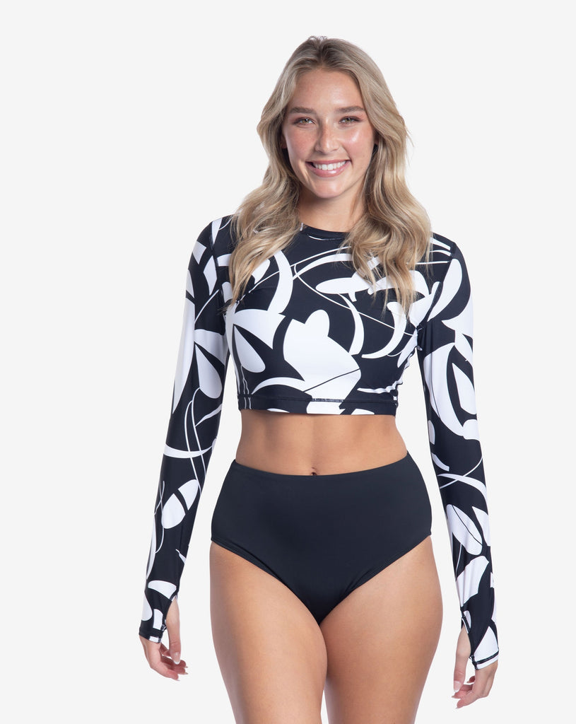 Women wearing printed black and white long sleeve everyday crop top with black swimsuit bottom. (Style 4015J) - BloqUV