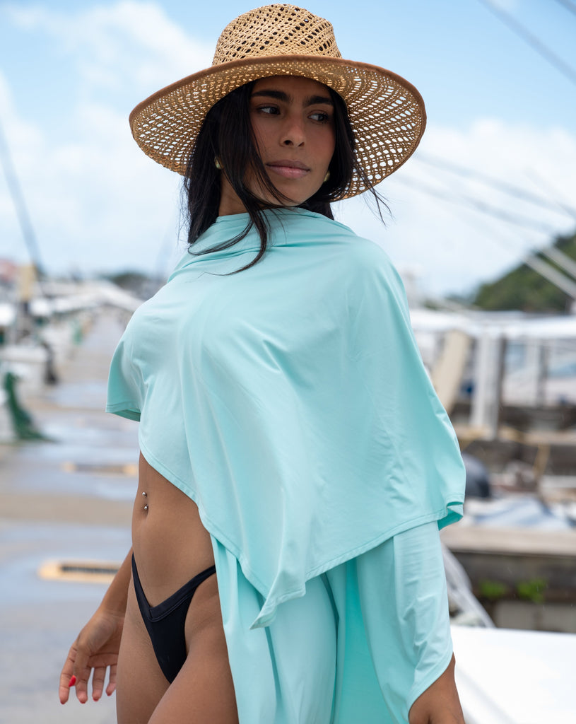 Women at the marina wearing mint blanket wrap around her shoulders. (Style 5000) - BloqUV