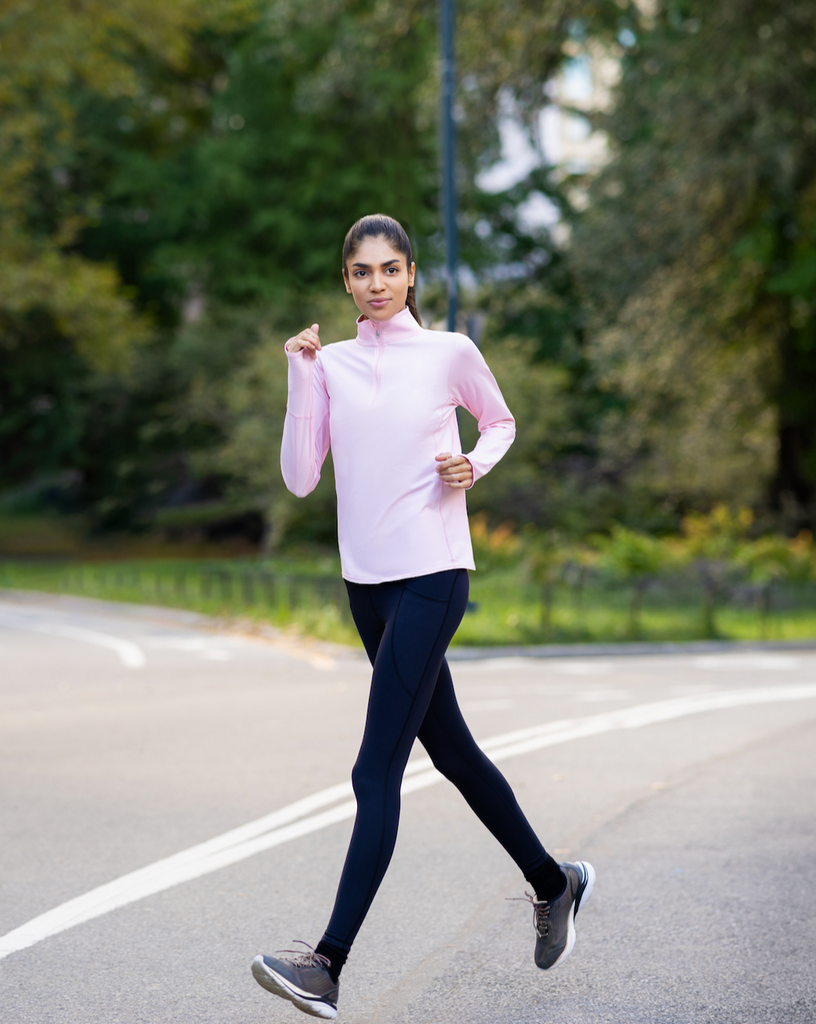 Women running outside wearing tickle me pink relaxed mock zip top. (Style 3002) - BloqUV
