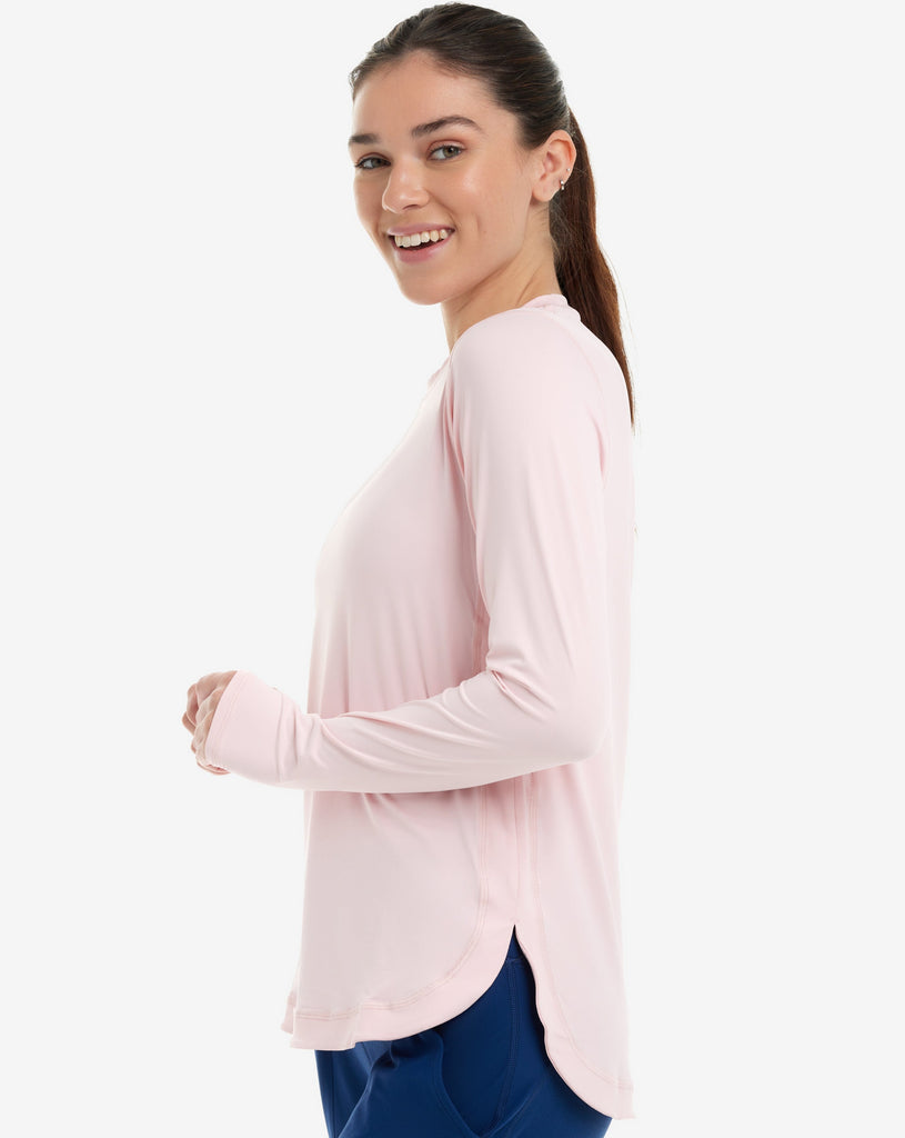 Women wearing tickle me pink relaxed scallop top with navy tights. (Style 2015) - BloqUV