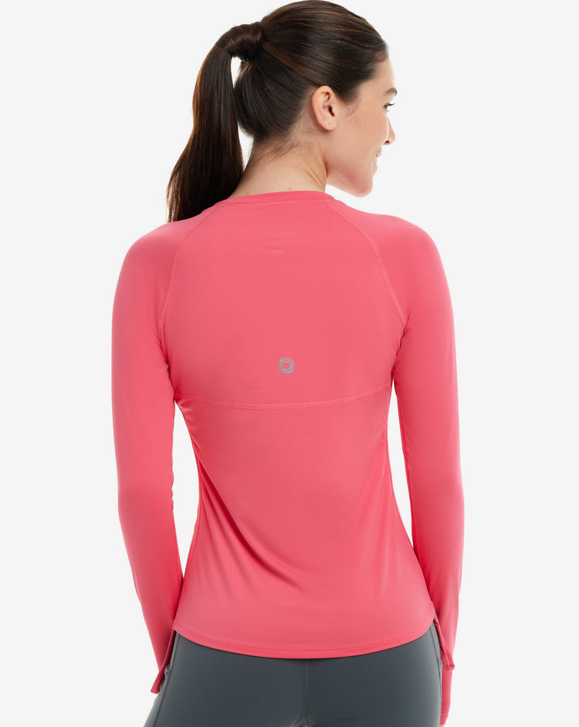 Women wearing watermelon long sleeve drawstring crew. Picture shows the back of the shirt. (Style 2006) - BloqUV