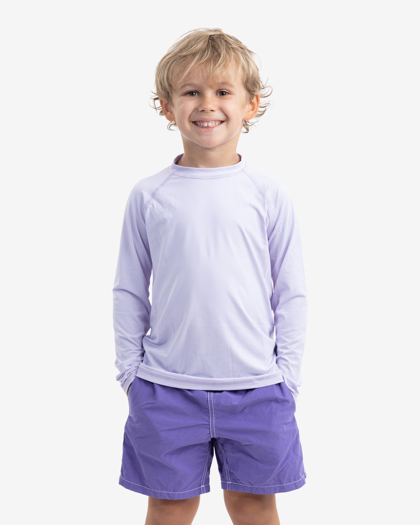 Boy wearing lavender color top with swim shorts. (Style 1005K) - BloqUV