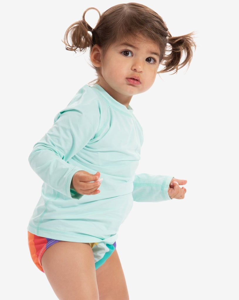 Toddler girl wearing mint crew neck top. (Style 1005T) - BloqUV