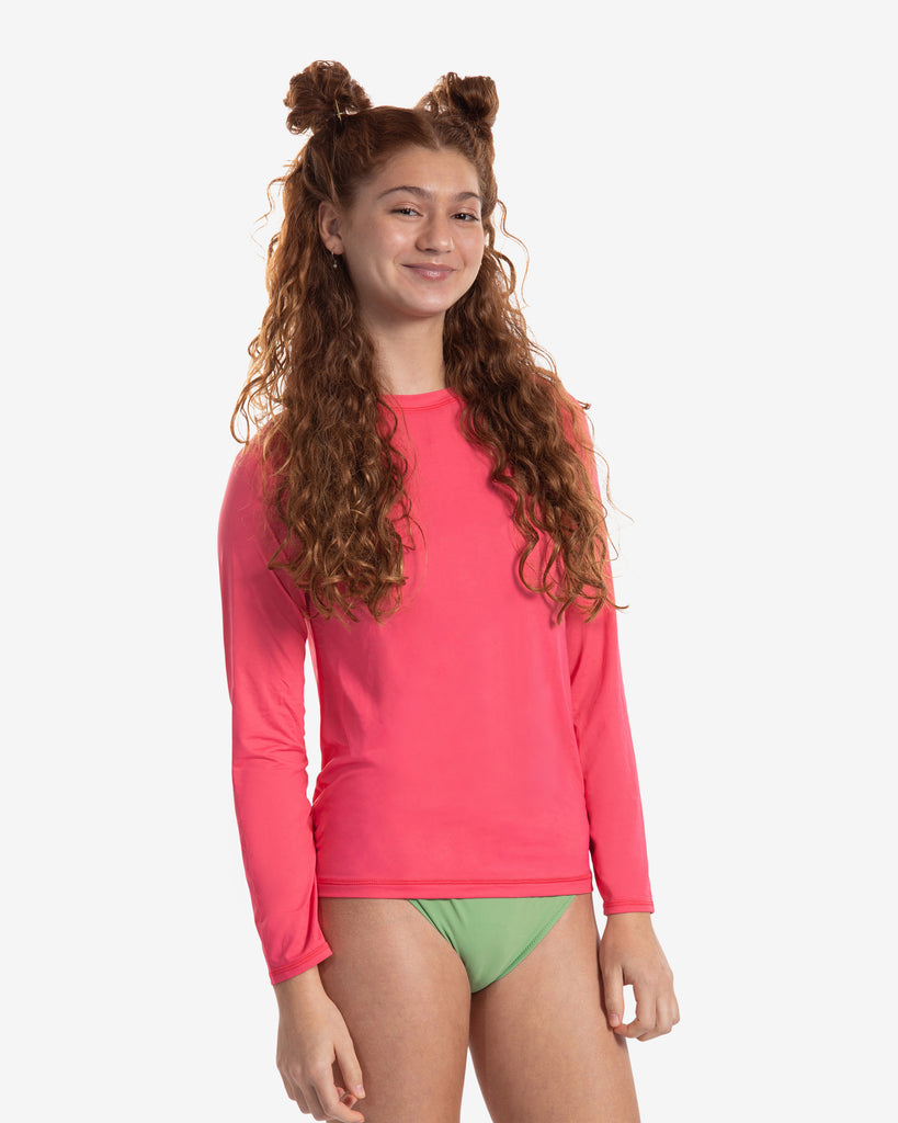 Girl wearing watermelon UPF top over a swimsuit. (Style 1005K) - BloqUV