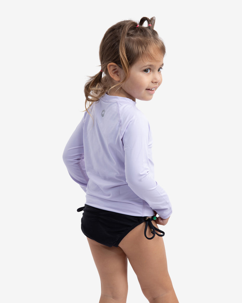 Toddler girl wearing lavender crew neck top. (Style 1005T) - BloqUV