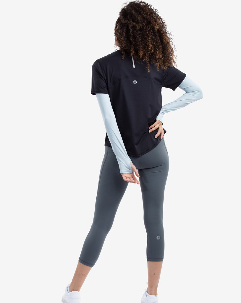Women wearing black short sleeve crew top with soft grey sun sleeves and smoke tights. (Style 1101) - BloqUV