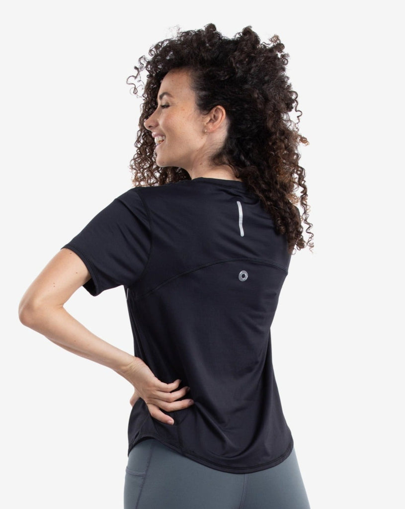 Women wearing black short sleeve crew top with and smoke tights. Picture shows back of shirt with reflective. (Style 1101) - BloqUV