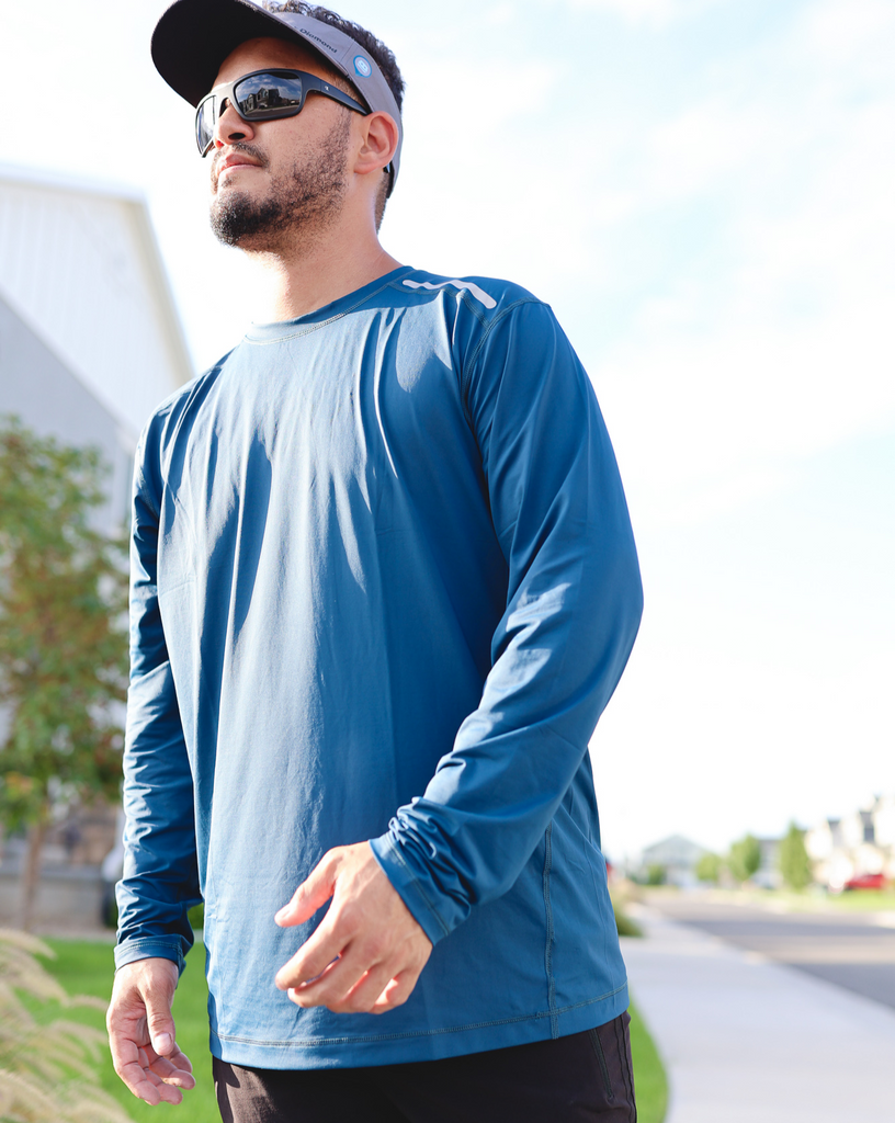 Man walking in the street wearing long sleeve jet tee shirt in navy blue. (Style 12002) - BloqUV