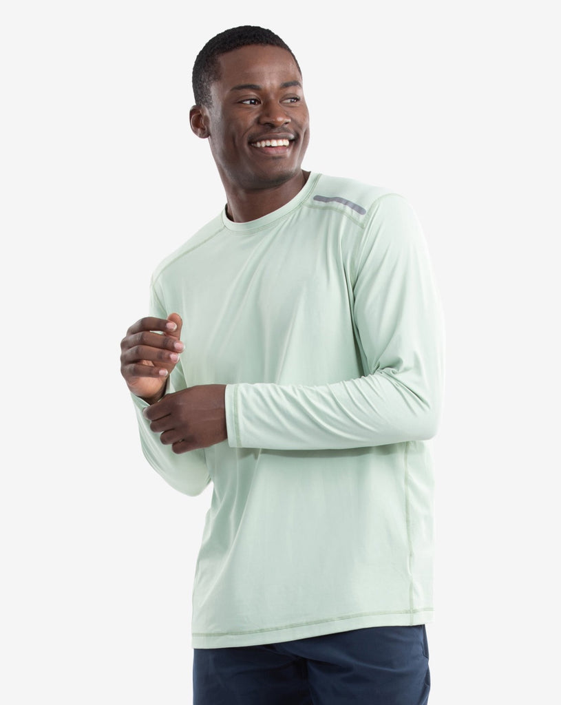 Man wearing long sleeve jet tee shirt in sage. (Style 12002) - BloqUV