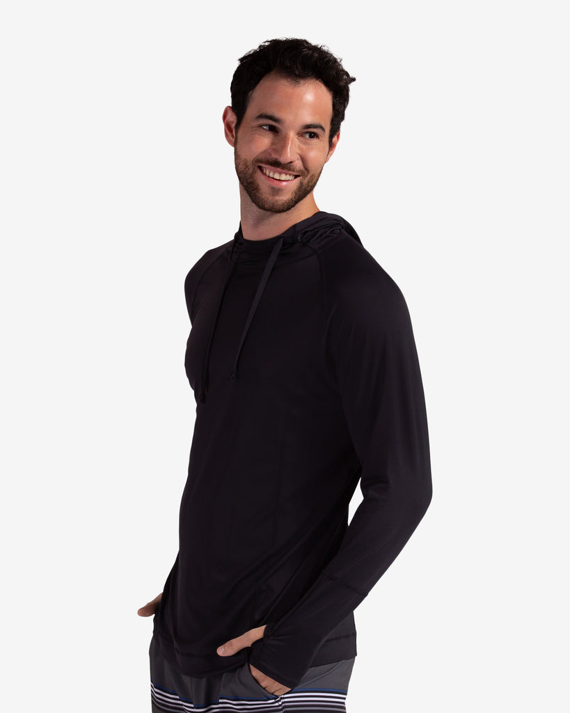 Man wearing black color unisex long sleeve hoodie shirt. (Sttyle 12007) - BloqUV